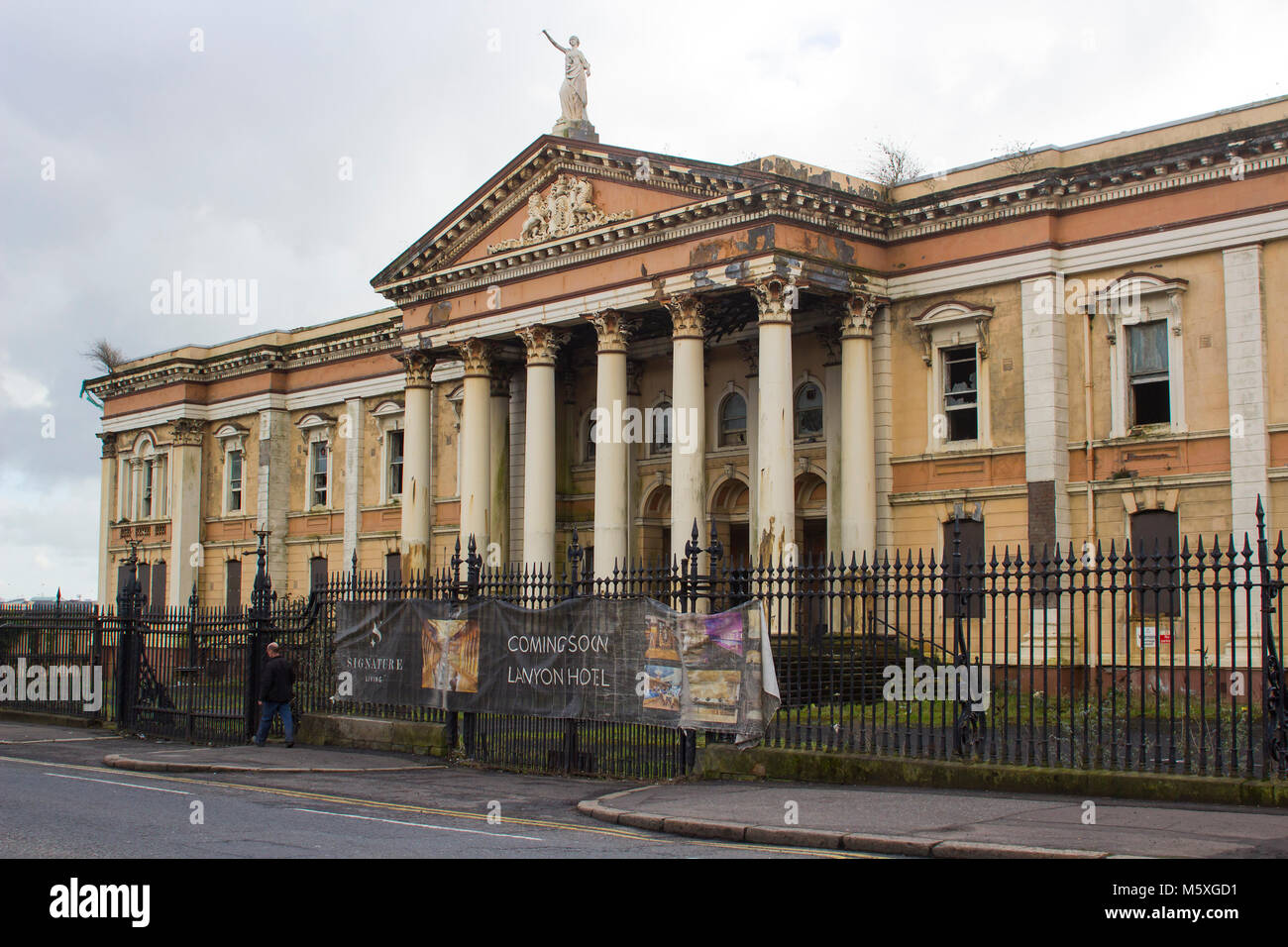 The ruins of the historic Crumlin Road courthouse in Belfast Northern Ireland that was damaged by fire and is waiting redevelopment Stock Photo