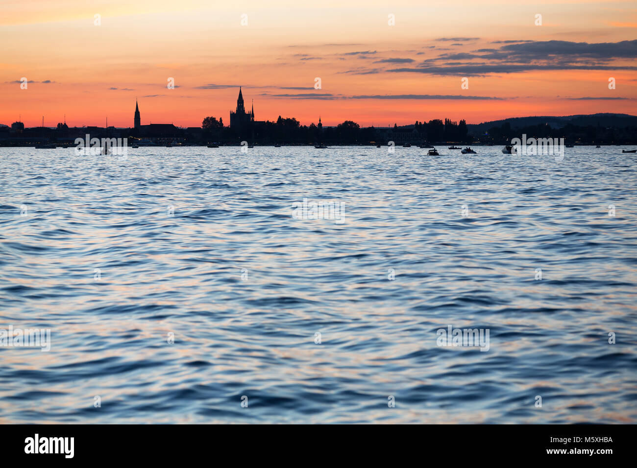 Evening atmosphere, view over Lake Constance on Constance with Münster, Thurgau, Switzerland Stock Photo