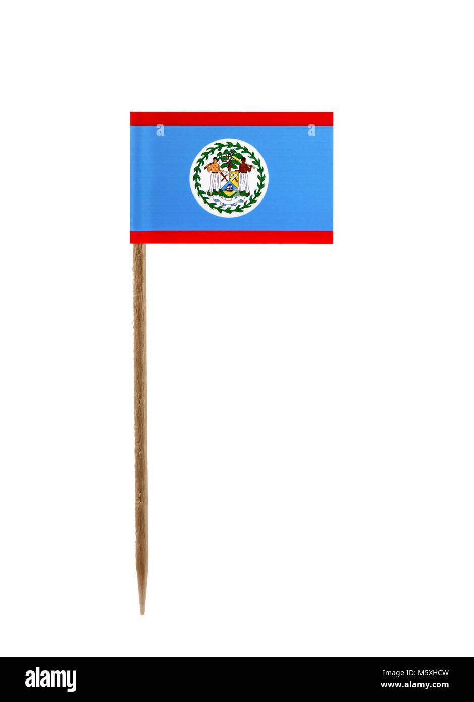 Tooth pick wit a small paper flag of Belize Stock Photo