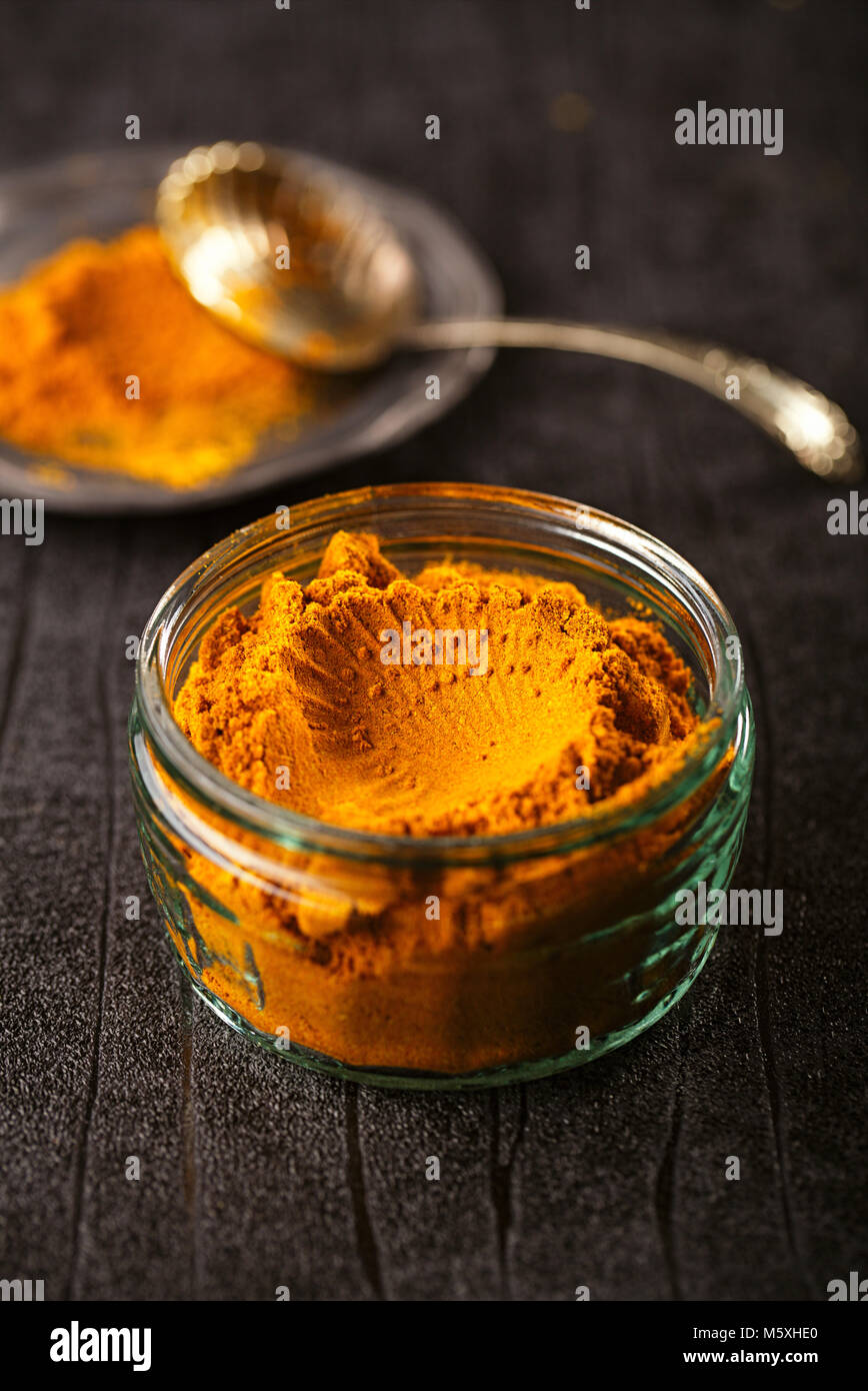 turmeric latte spice mix on dark background Stock Photo Alamy