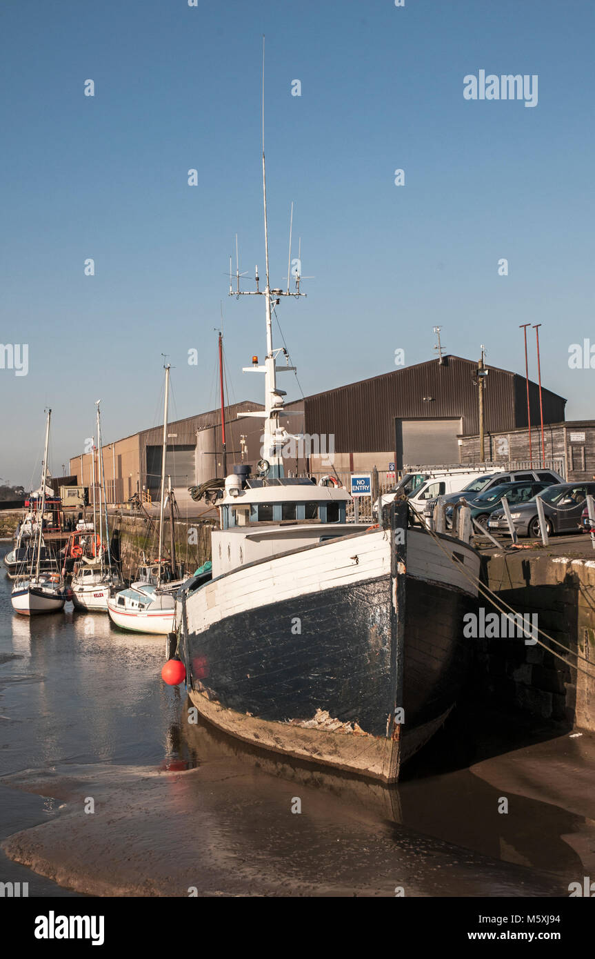 Boat tied to quay at Glasson Dock Lancashire England UK Stock Photo
