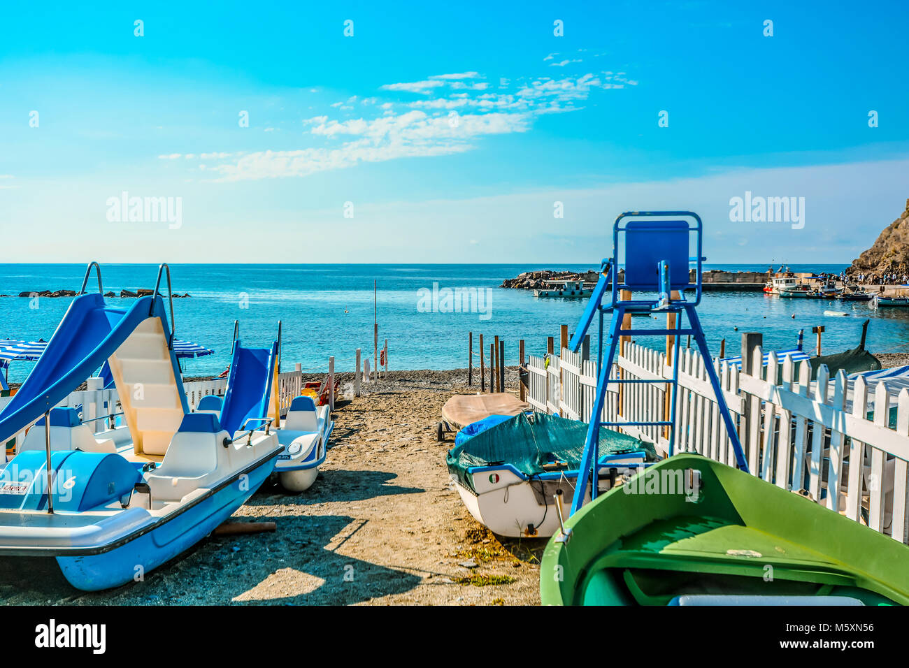 Pedal boats on the sandy beach on the Ligurian coast of Monterosso al Mare  on a sunny summer day in Cinque Terre Italy on the Italian Riviera Stock  Photo - Alamy