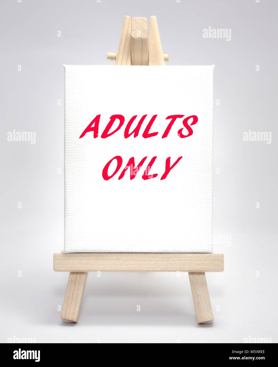 Adults only white canvas artist easel Stock Photo