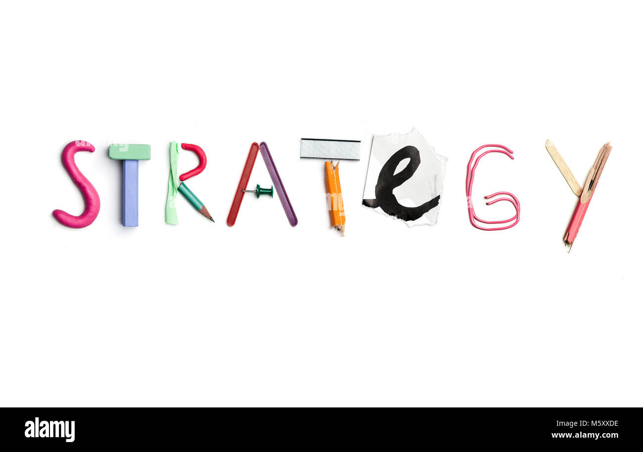 The word strategy created from office stationery Stock Photo - Alamy
