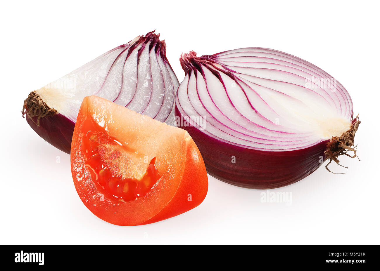 Half of fresh red tomato near slice and half of unpeeled red onion ...