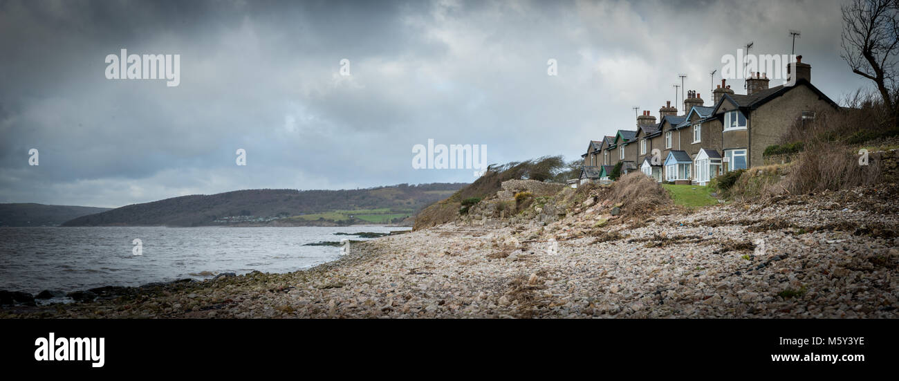 Shore Road in Silverdale.  A row of terraced cottages look out over Morecambe Bay Stock Photo