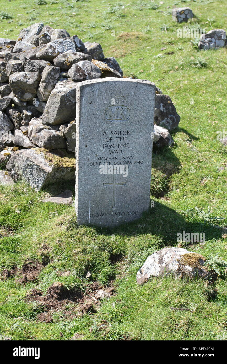 Unknown sailor war grave in Cemetery Isle of Muck Scotland May 2012 Stock Photo