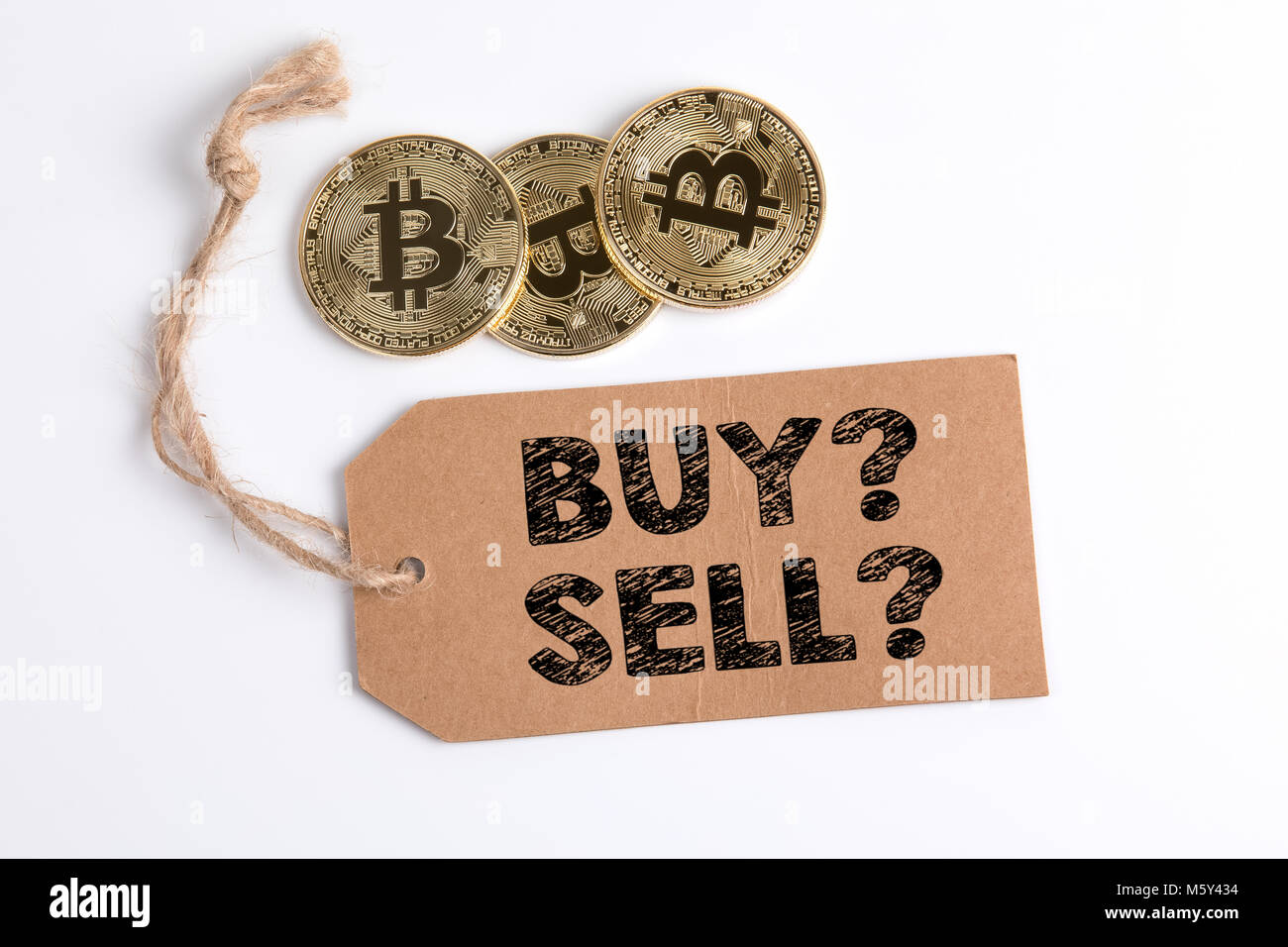 crypto currency, golden bitcoin with a carton price tag on white background  Stock Photo - Alamy