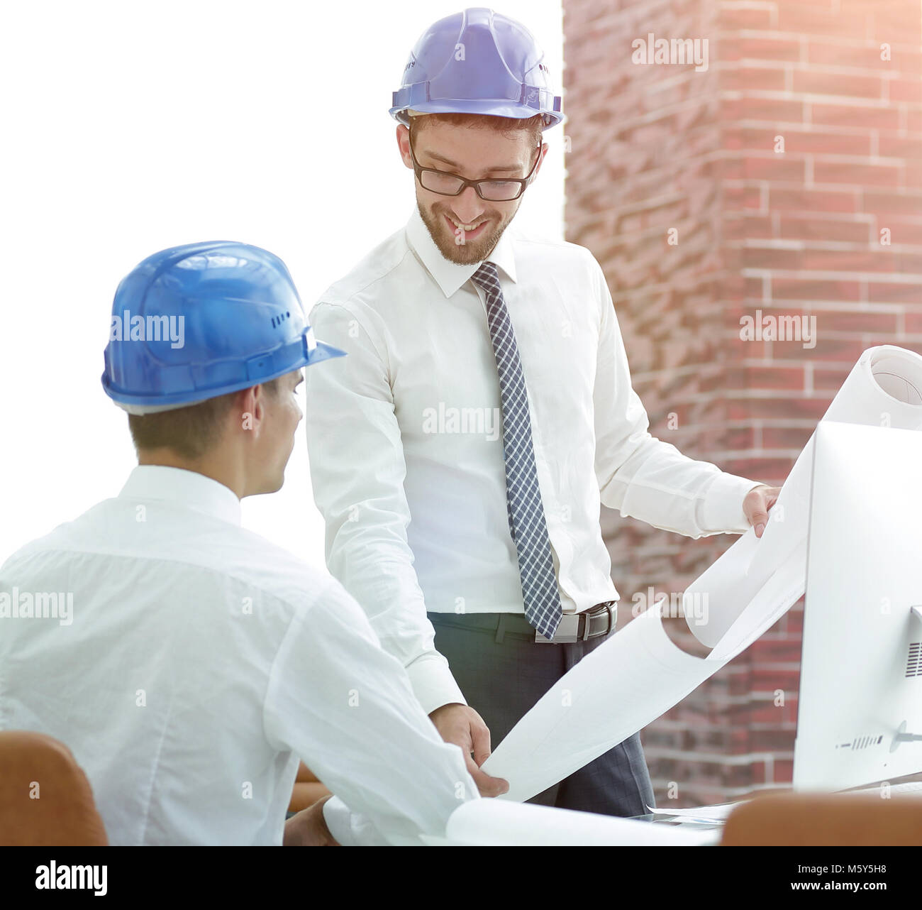 architect and engineer, considering a building project Stock Photo