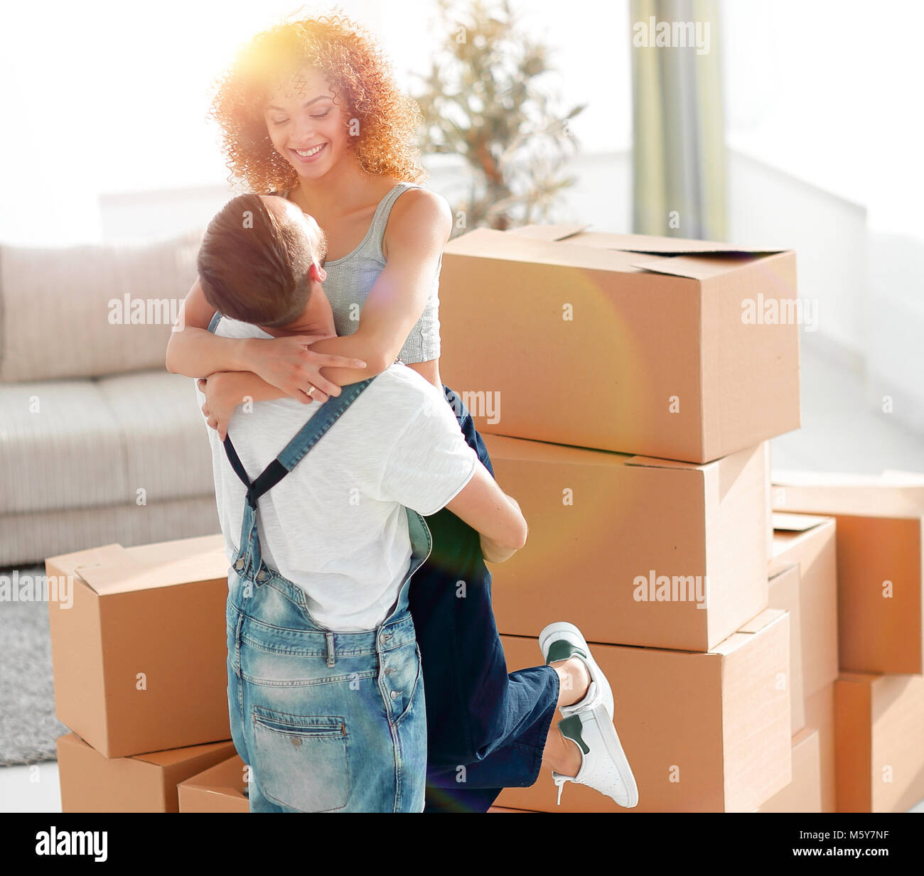 young couple moving into a new home. Real estate concept Stock Photo ...