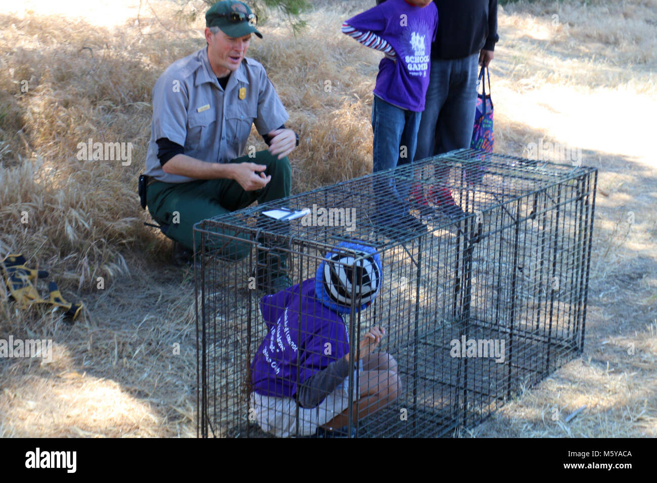 Mountain lion cage. Ranger Jeff shows students how mountain lion cages