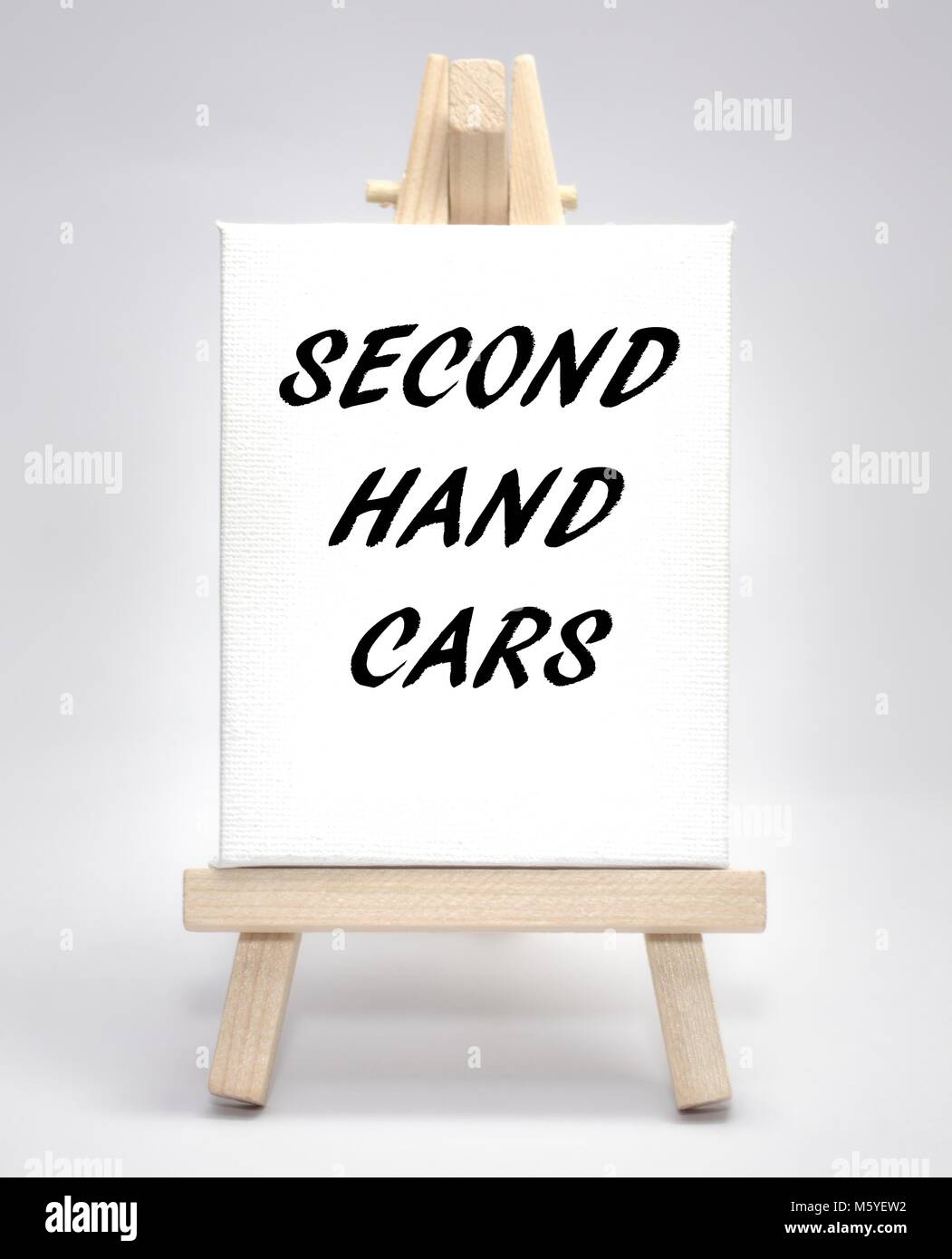 Second hand car concept white canvas artist easel Stock Photo