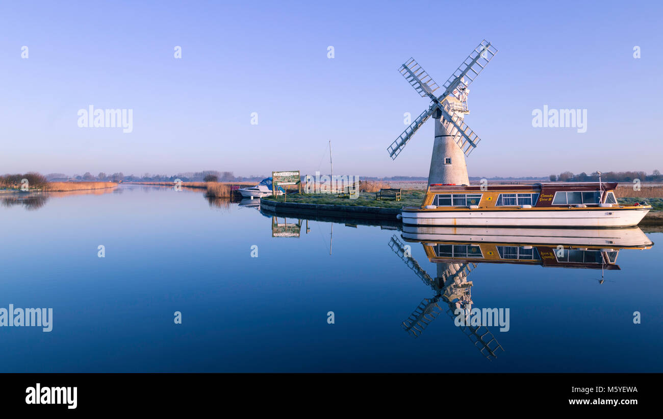 A tranquil dawn on the River Thurne in the Norfolk Broads. Stock Photo
