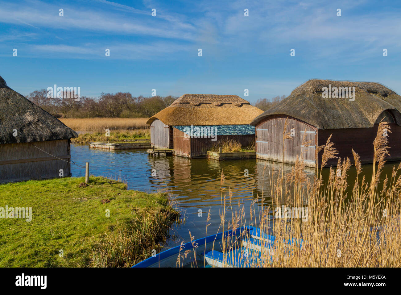 Thatched boat houses at Hickling in the Norfolk Broads Stock Photo Alamy