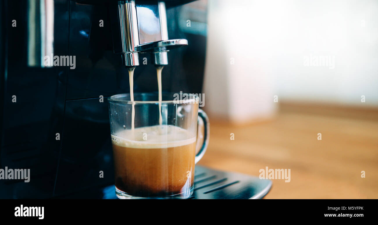 Coffee machine making coffee in morning with crema Stock Photo Alamy