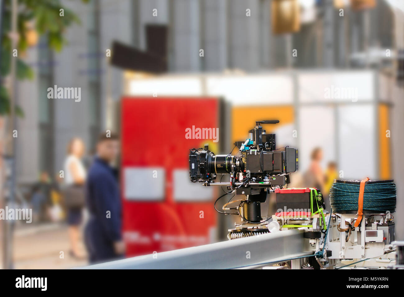 Big professional camera on rails. Outdoors movie set. Cinema pro Stock Photo