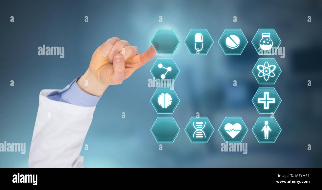 Doctor hand interacting with medication pill icon in hexagon interface Stock Photo