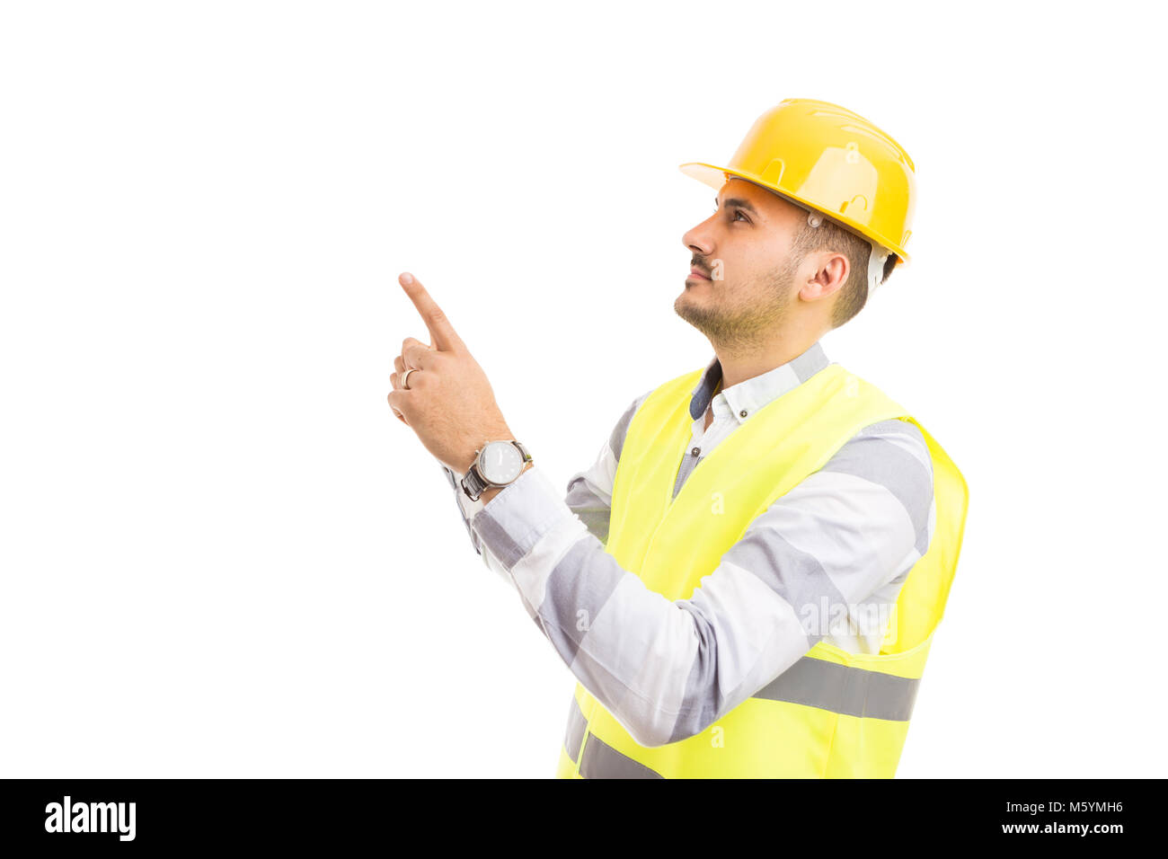 Architect constructor or engineer pointing and looking up isolated on ...
