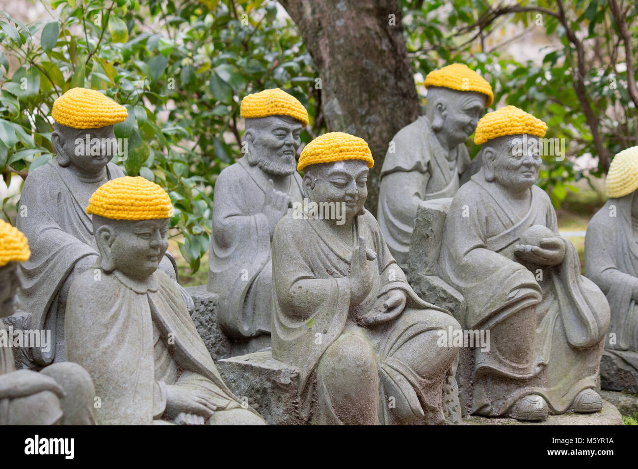 Daishō-in or Daisyō-in is a historic Japanese temple complex on Mount Misen. Five hundred of Shaka Nyorai’s disciples statues guide you to the temple. Stock Photo