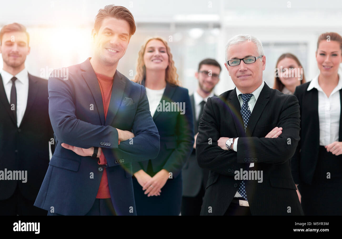 business partners standing in front of the business team Stock Photo ...