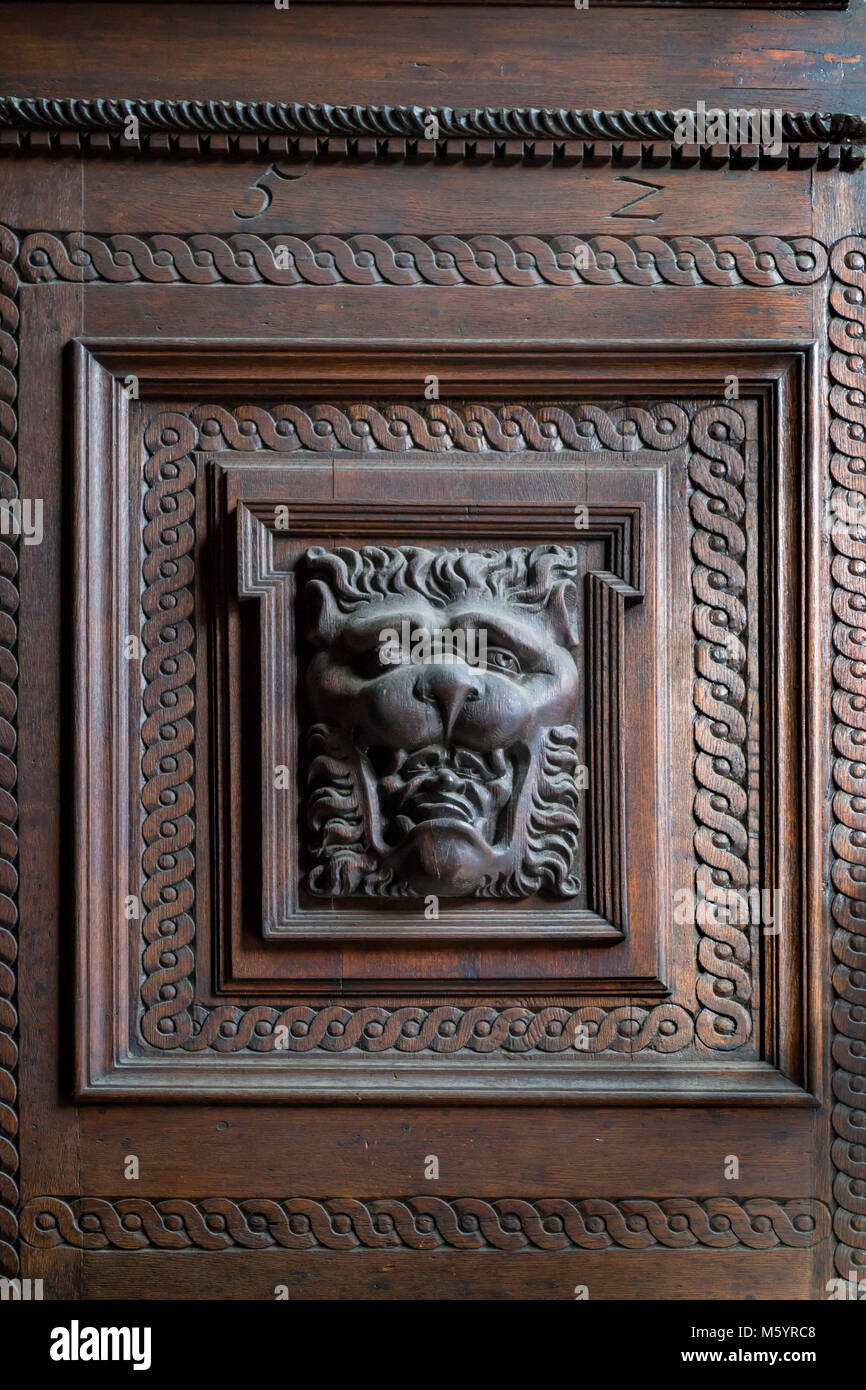 Prague, Czech Republic - October 9, 2017: Old Town City Hall, Staromestske Namesti, door with wood carvings of lion head with a mans head in his mouth Stock Photo