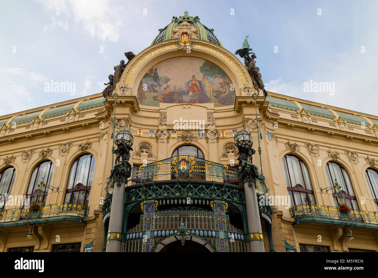 Prague, Czech Republic - October 9, 2017: The Art Nouveau building Municipal House in Prague with gold trimmings, stained glass  and sculpture Stock Photo