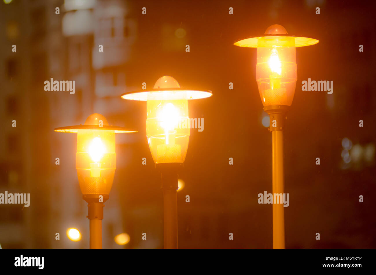 Street lighting. Streetlamp shines in the darkness Stock Photo Alamy