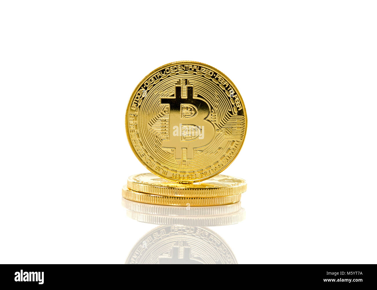 three bitcoins on white background Stock Photo
