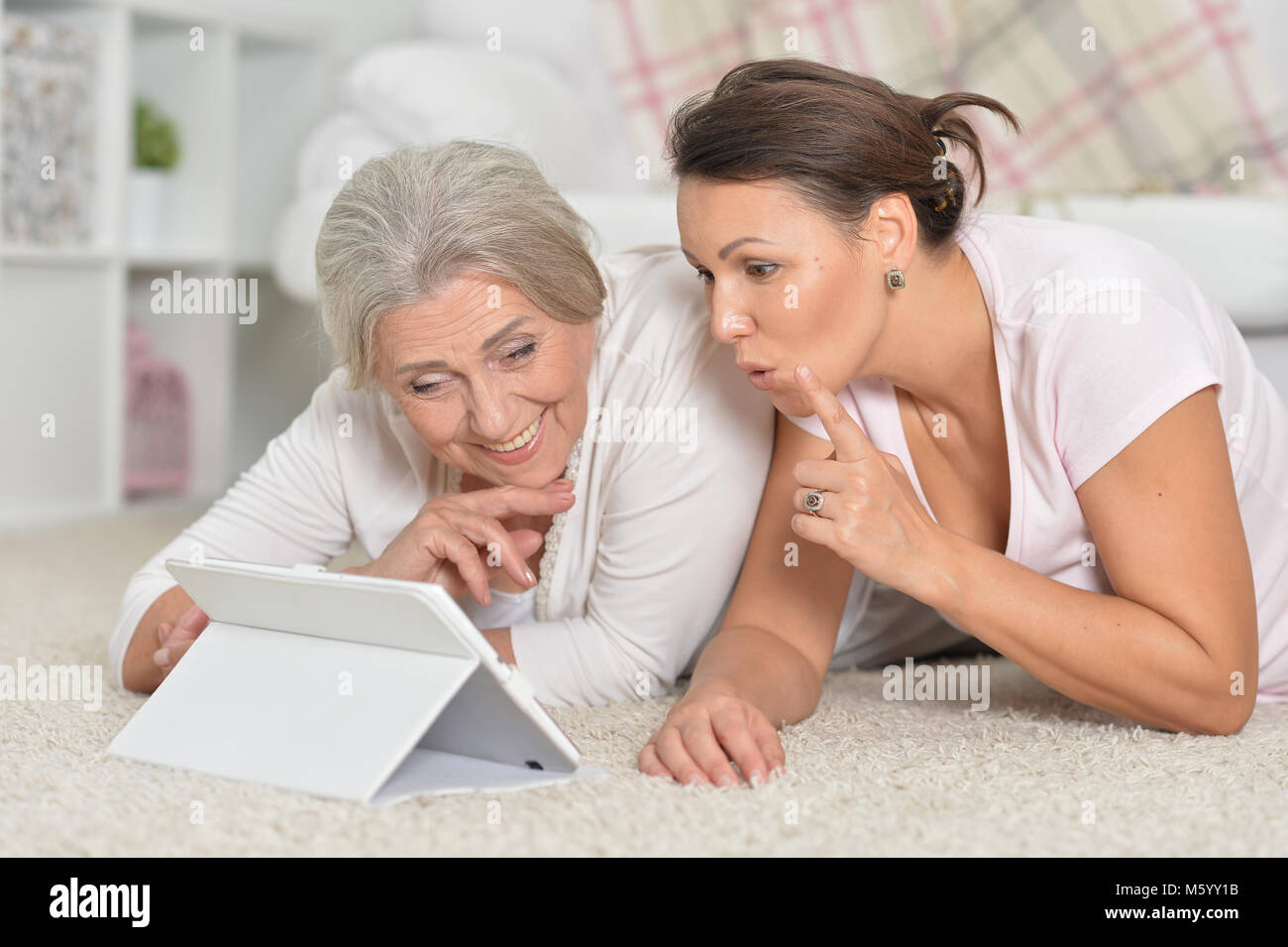 Mother and her using tablet Stock Photo