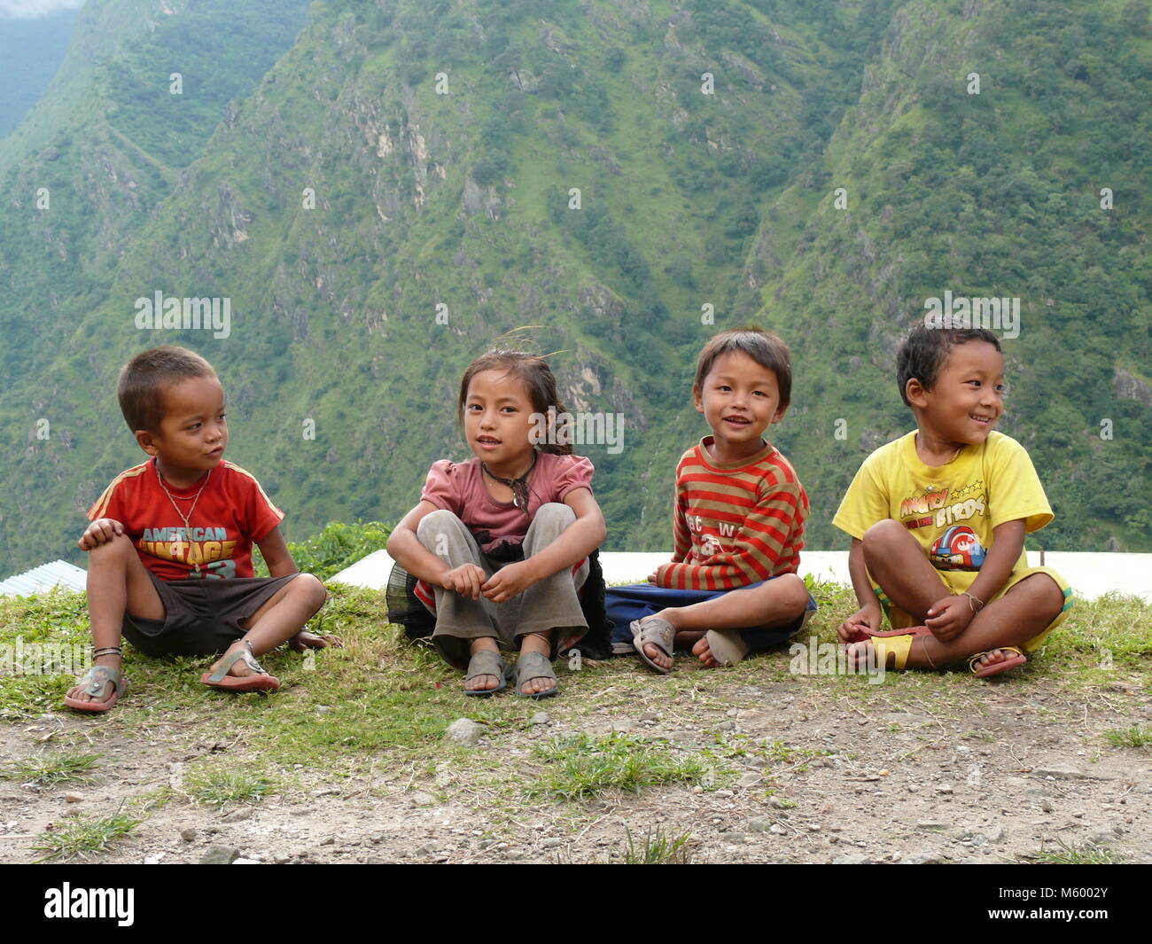 Tallo Chipla, Nepal, september 21, 2014: Nepalese children, Meeting local people in Nepal - Annapurna Circuit trek in Nepal Stock Photo