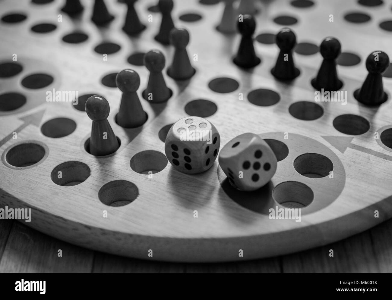 Ludo board family game. Close-up view. Black and white. Stock Photo