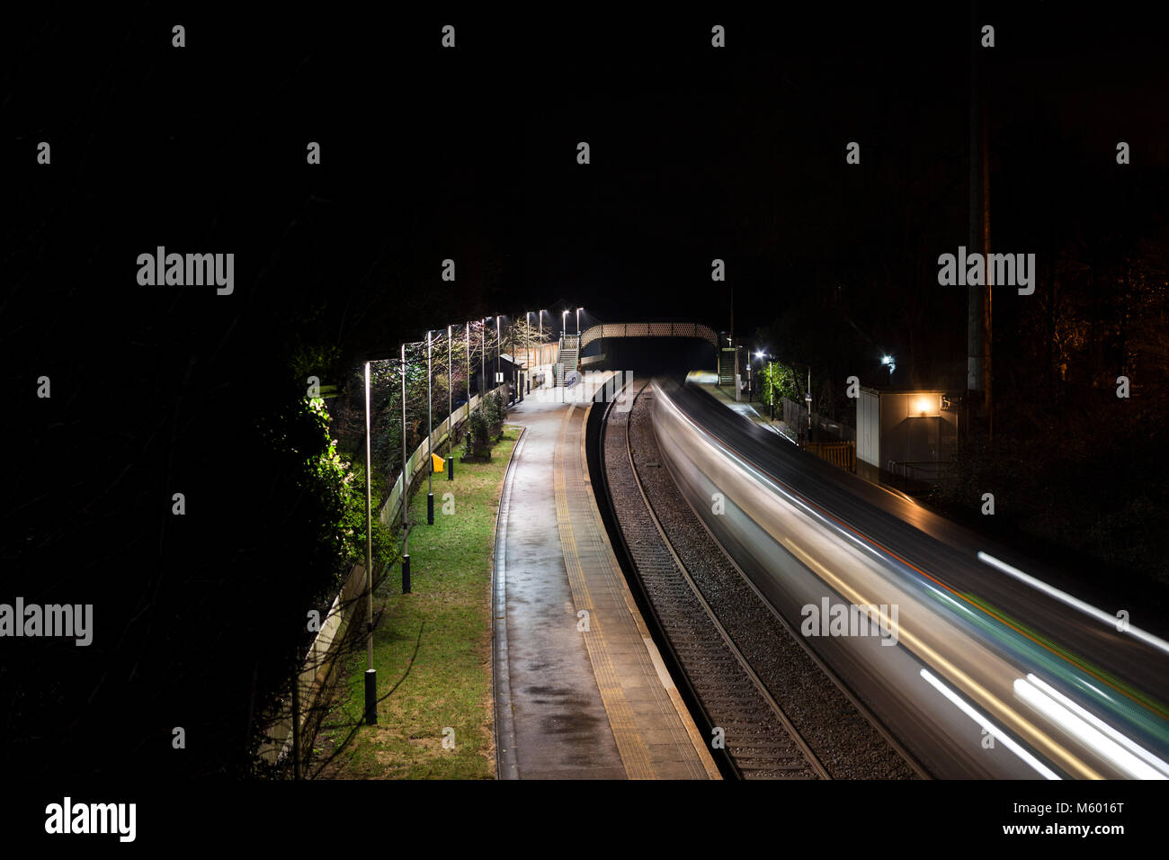 A train departing Cark (Cumbria) working a Preston Barrow In Furness