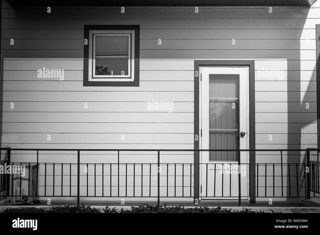 Abstract black and white image of architecture building interior design of wooden window and door of apartment. Stock Photo