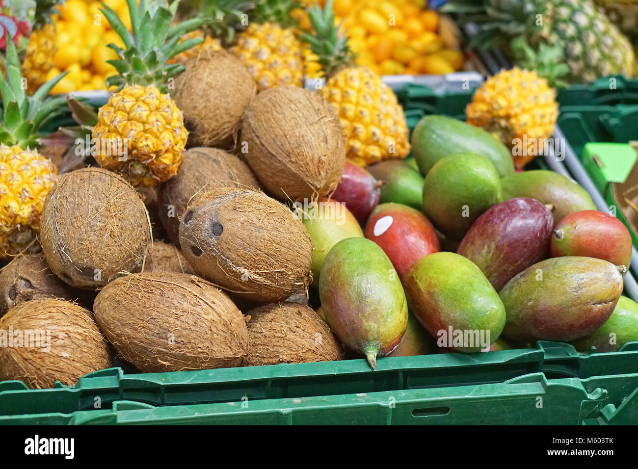 Tropical fruits in crates for sale Stock Photo Alamy