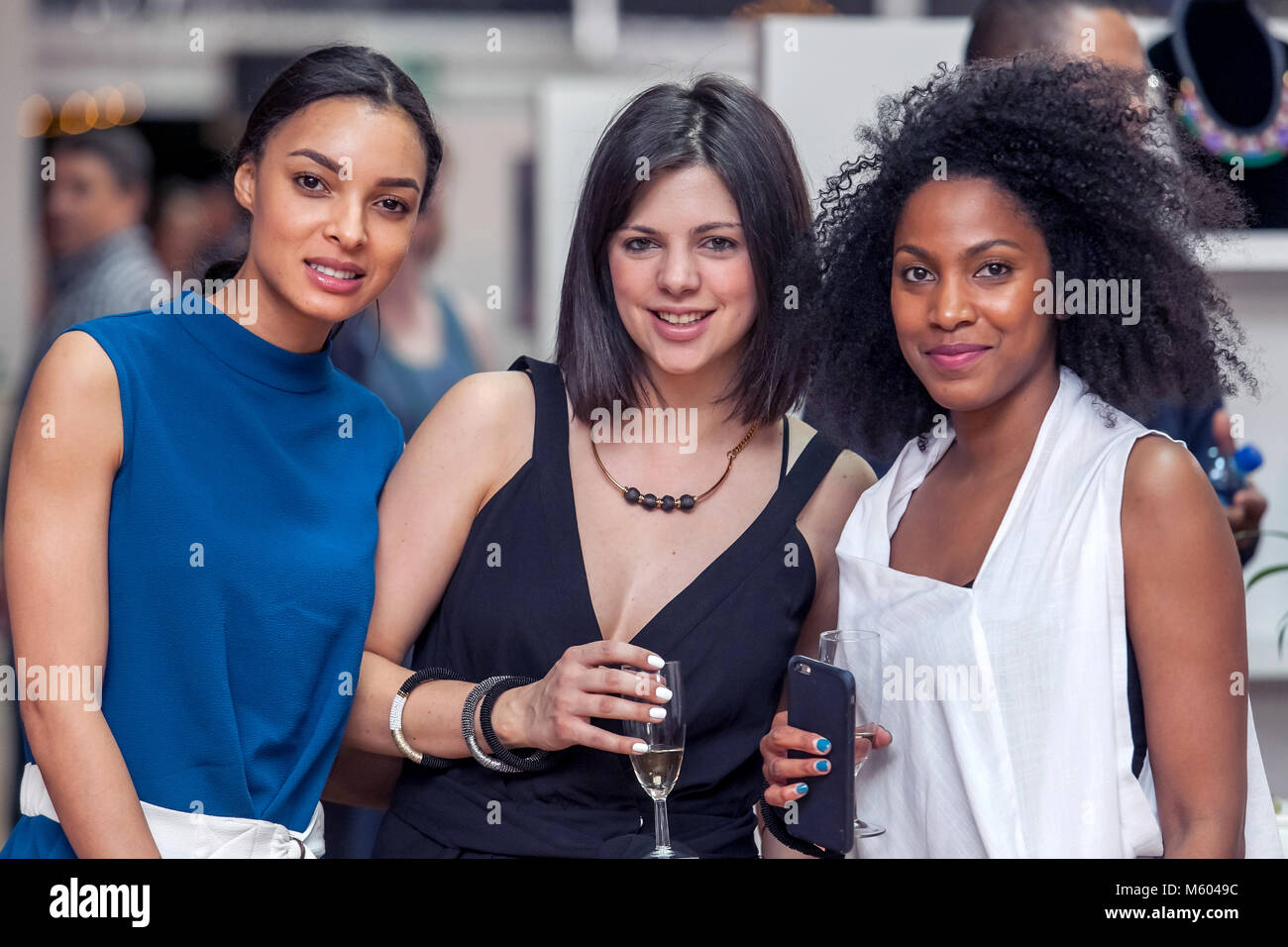 Cape Town, South Africa, 08/10/2015. Ladies smiling at night event