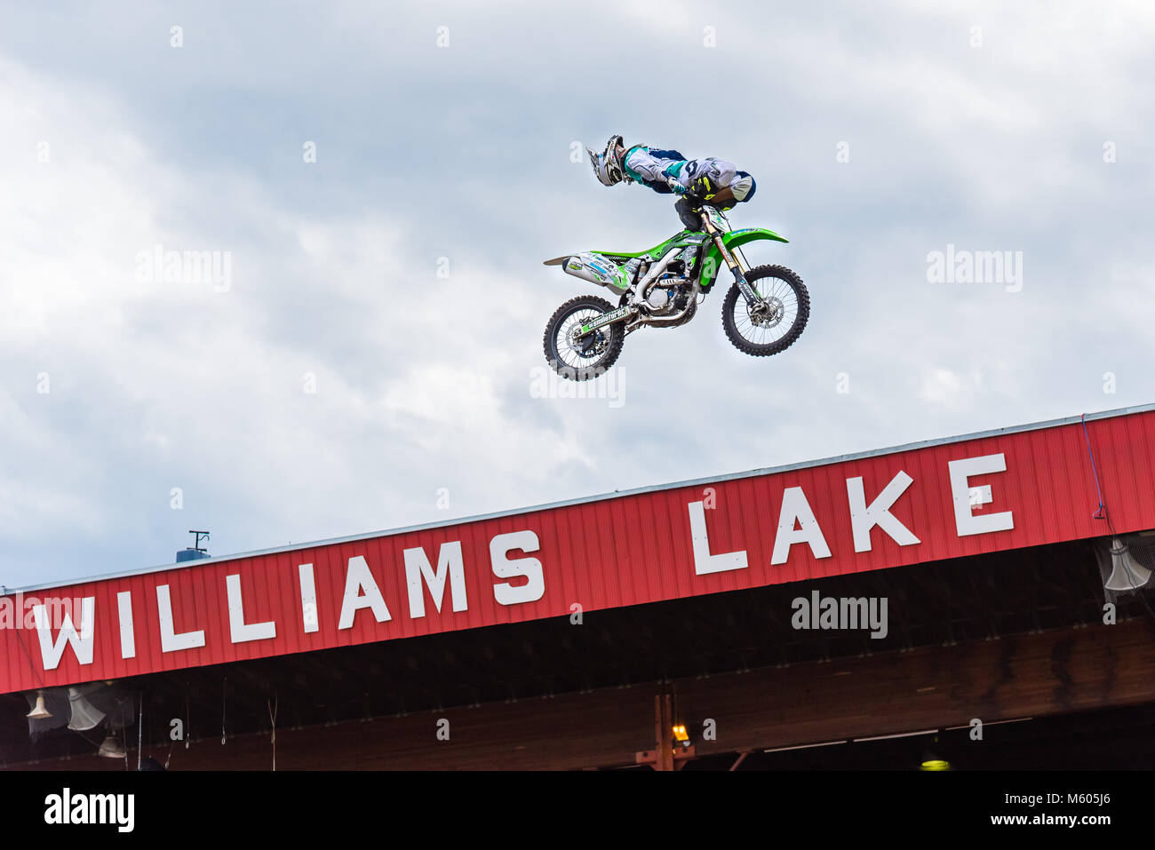 Global FMX Professional Freestyle Motocross team performs a stunt high  above the stands at the 90th Williams Lake Stampede Stock Photo - Alamy