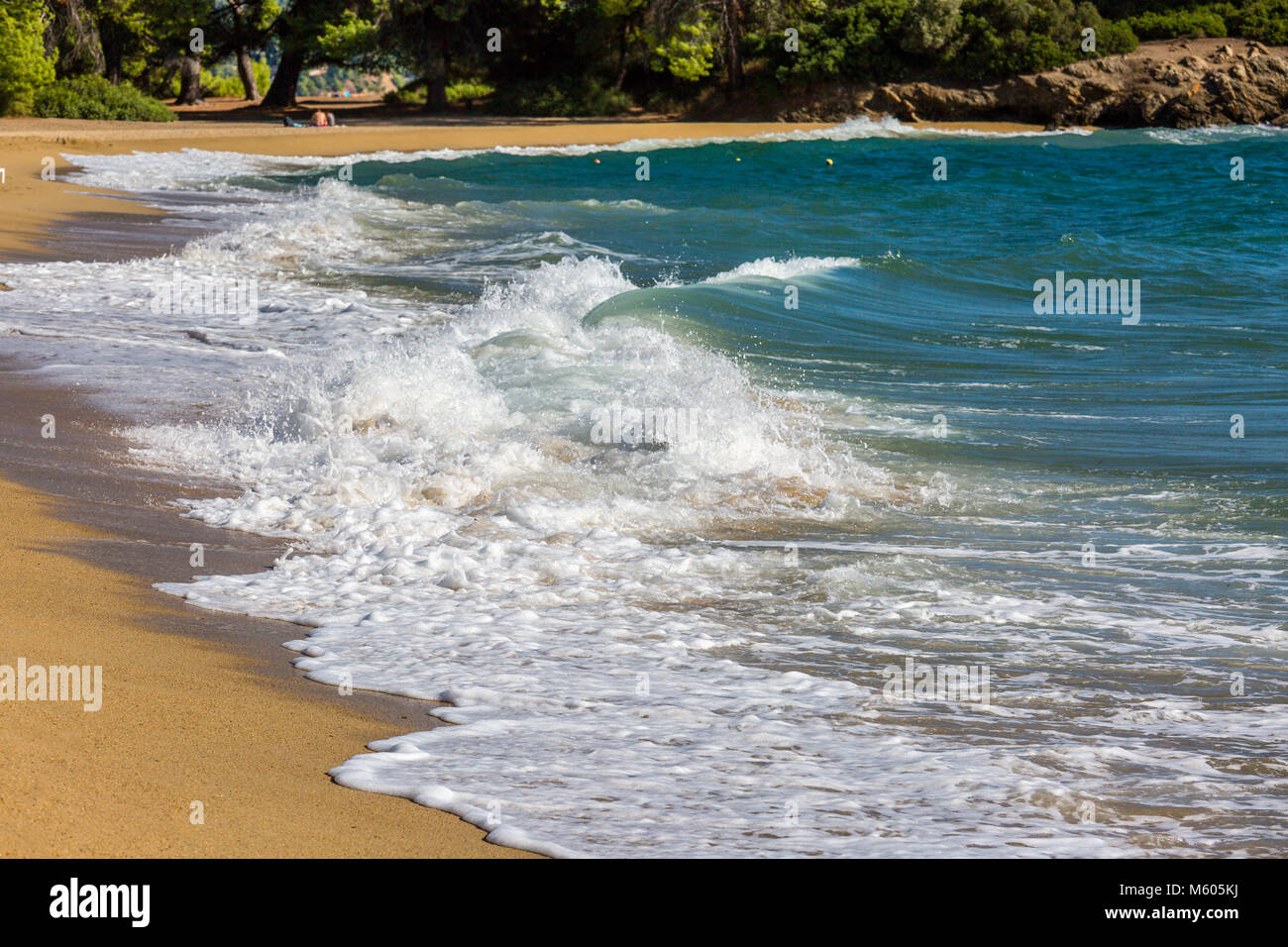 Sandy beach small ocean waves hi-res stock photography and images - Alamy