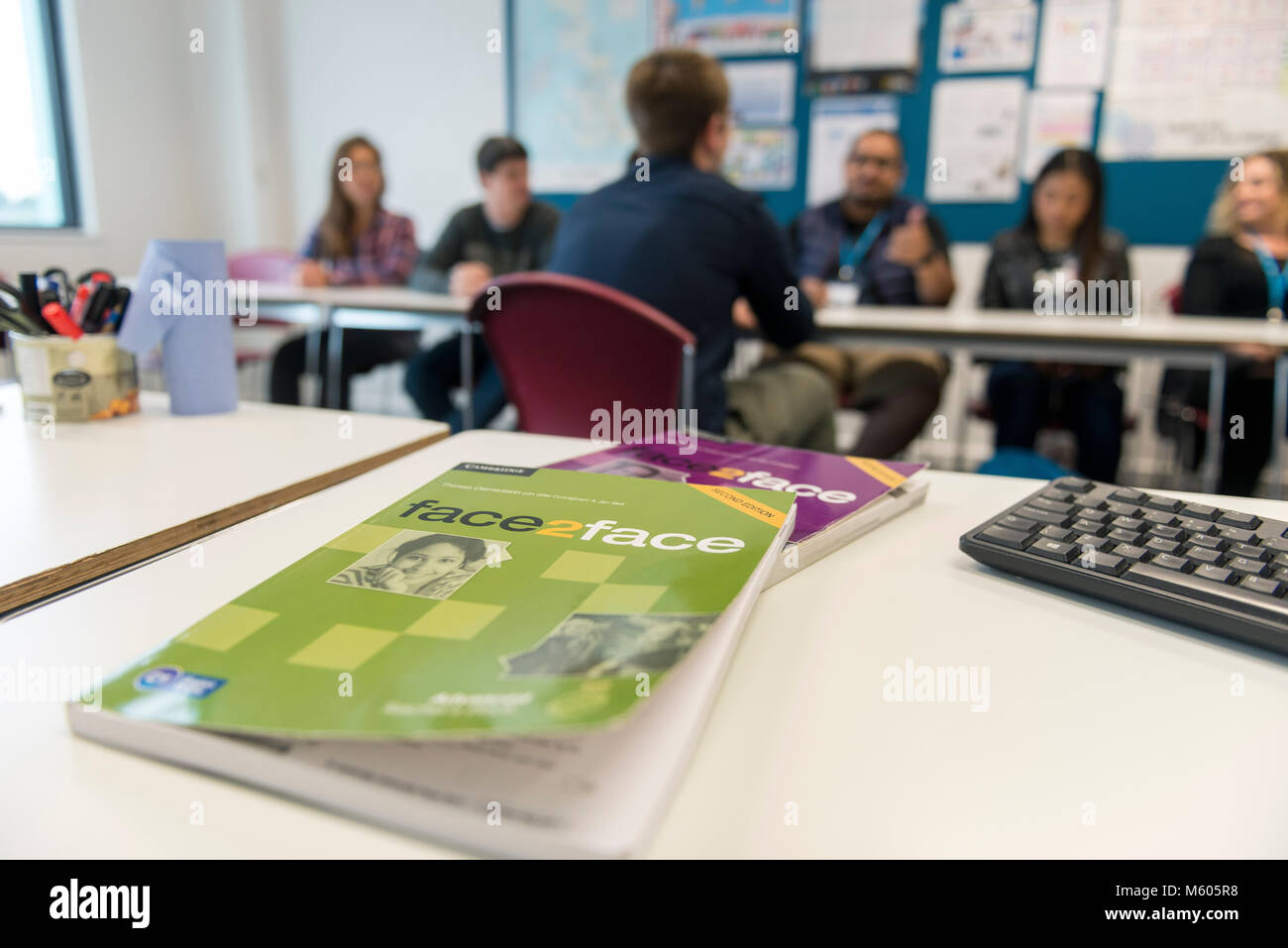 real overseas students learn english at college in the classroom and library of a college / university Stock Photo