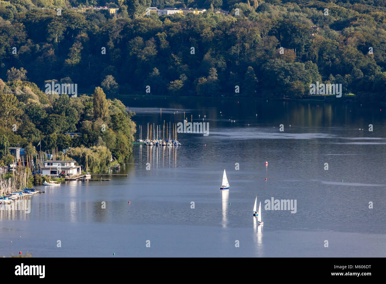 The Baldeneysee Lake, a reservoir of river Ruhr, in Essen, Germany, sailing boats, Stock Photo