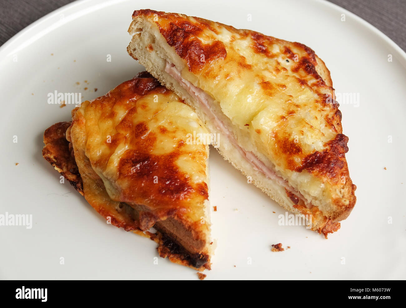 Tasty Croque Monsieur - toasted cheese and ham sandwich Stock Photo - Alamy