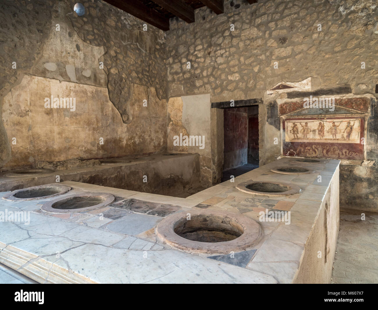 Excavated house and Thermopolium of Vetutius Placidus, Pompeii. Italy. Stock Photo