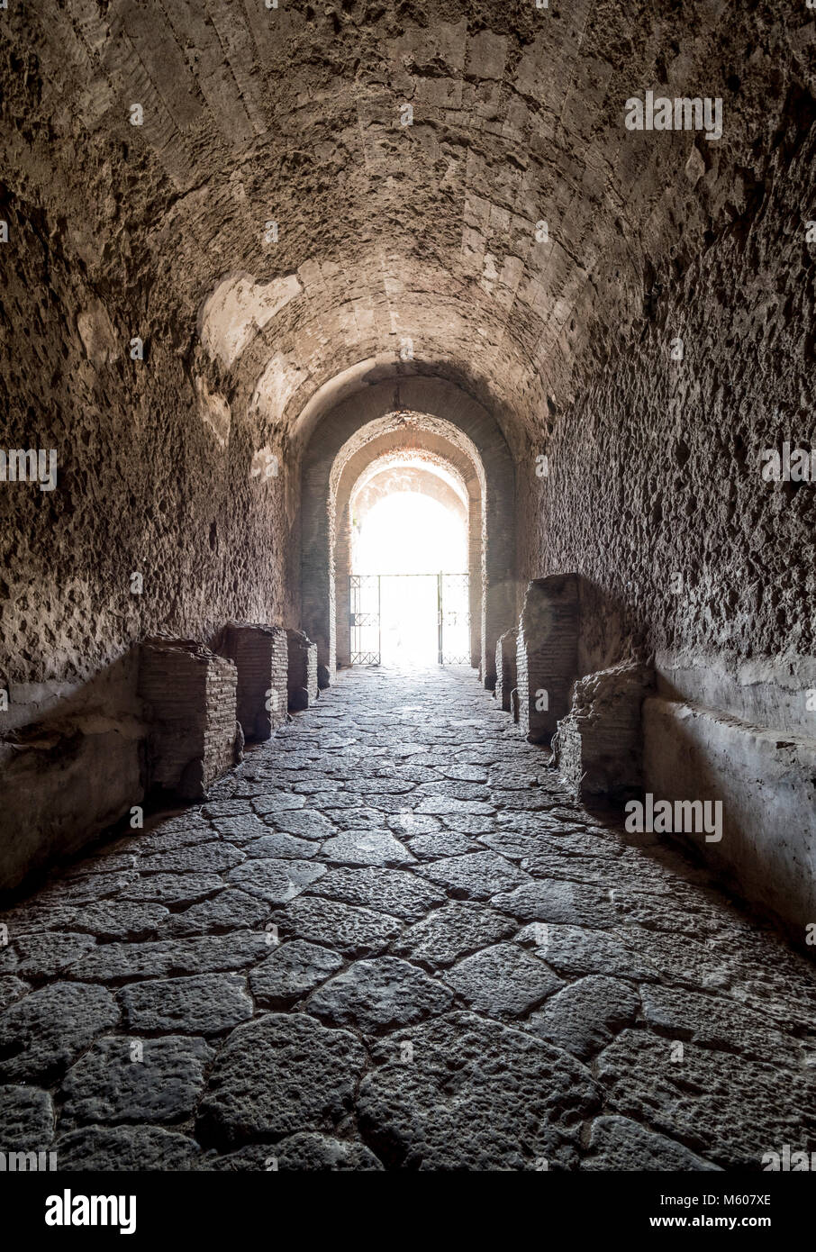 Entrance tunnel to The Amphitheatre of Pompeii, Italy. Stock Photo