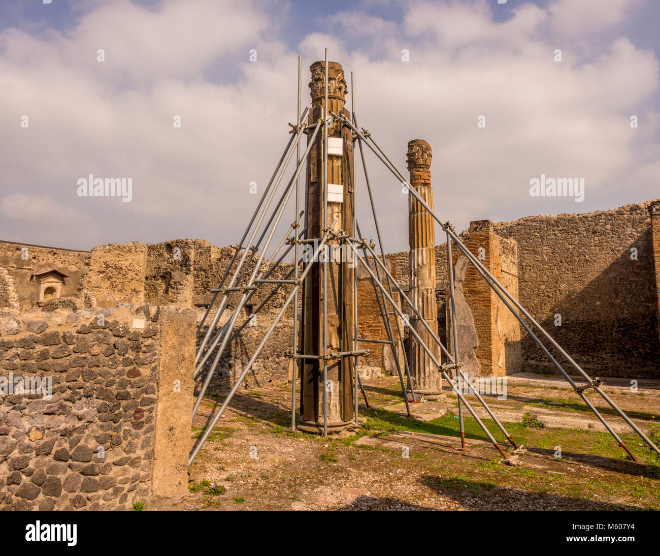 Scaffolding poles supporting one of the ancient columns excavated from ...