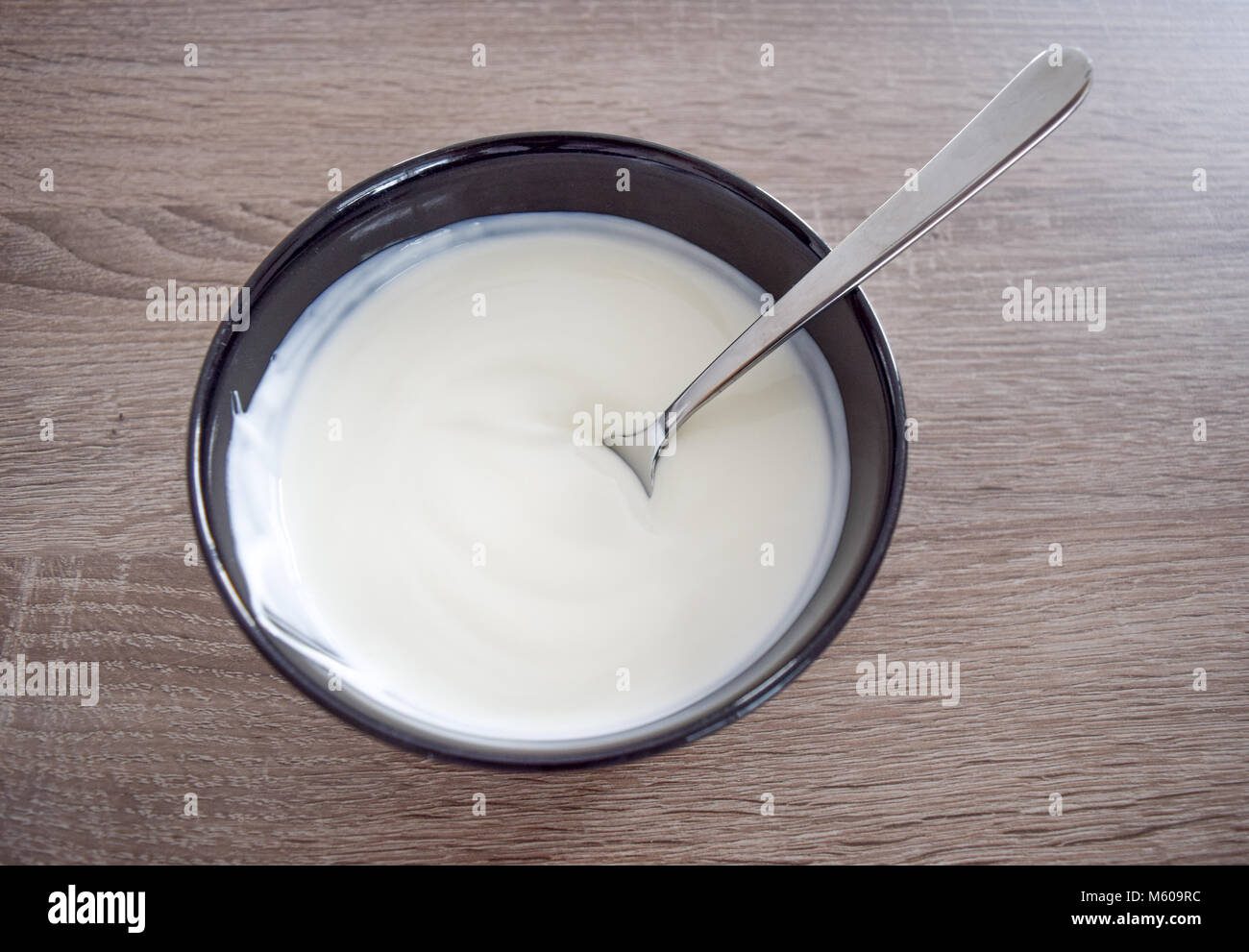 Spoon of yogurt hires stock photography and images Alamy