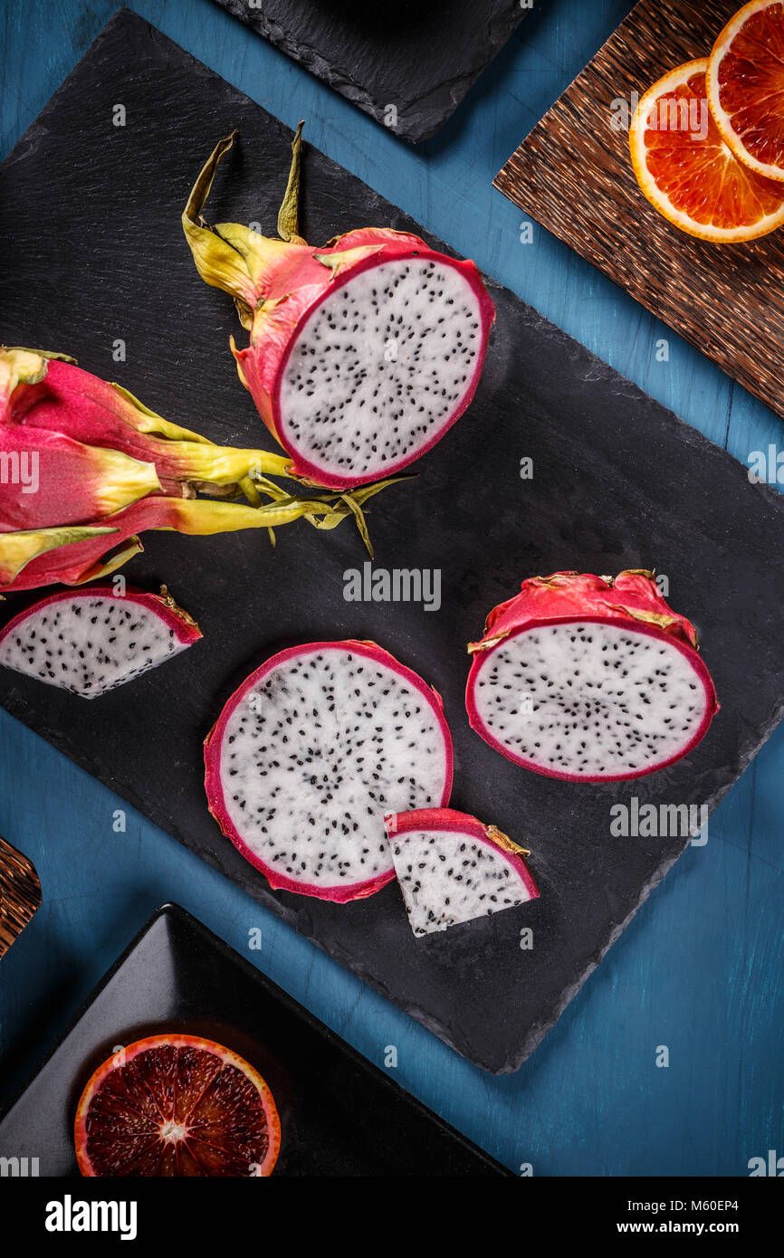 Pitahaya or dragon fruit on black slate Stock Photo