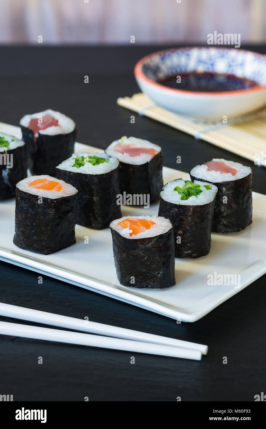 A selection of sushi rolls with salmon, tuna, cucumber and soy sauce dip Stock Photo Alamy