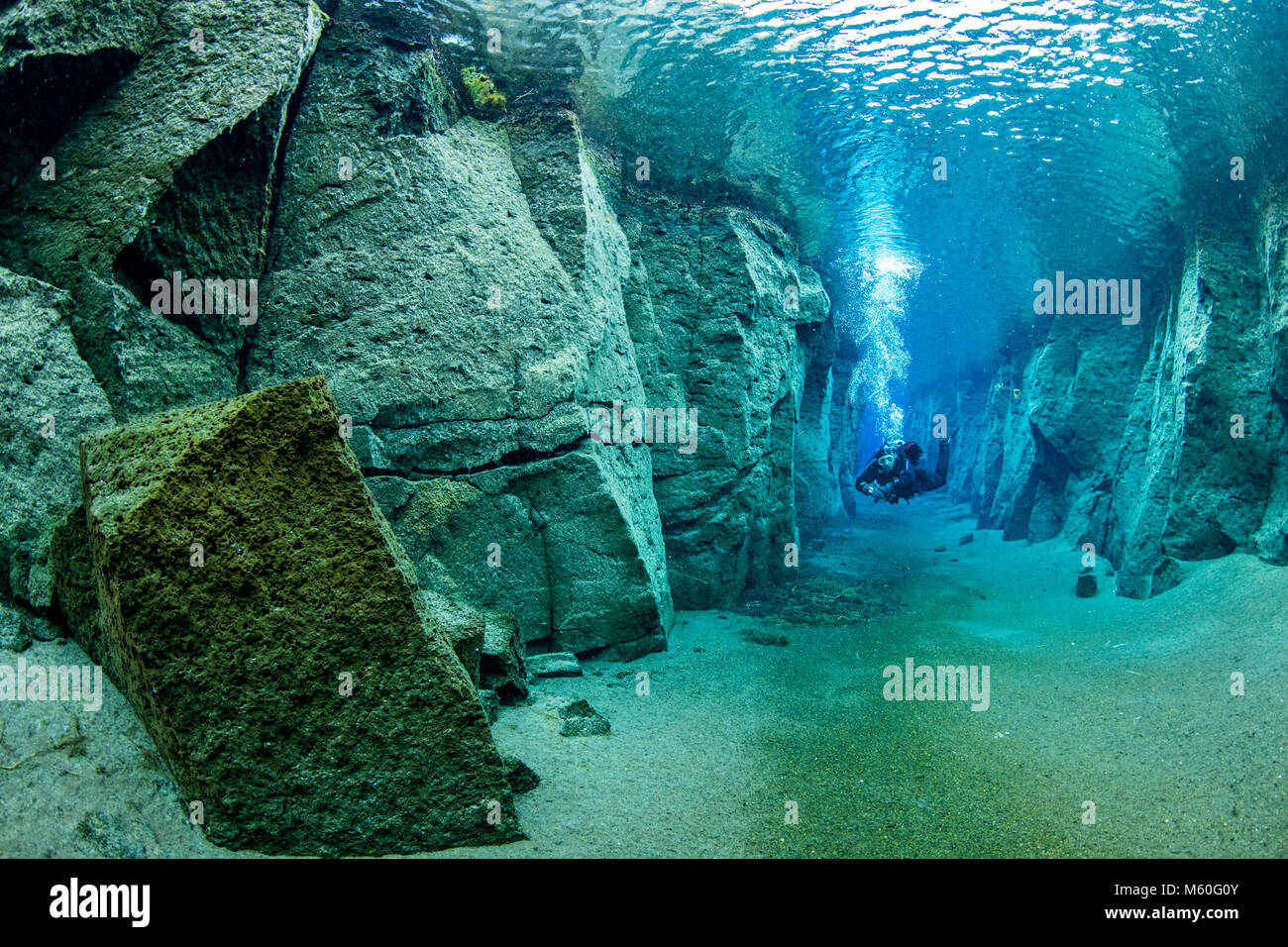 Scuba diving in Volcanic Crack Nesgja, Asbyrgi National Park, Iceland Stock Photo
