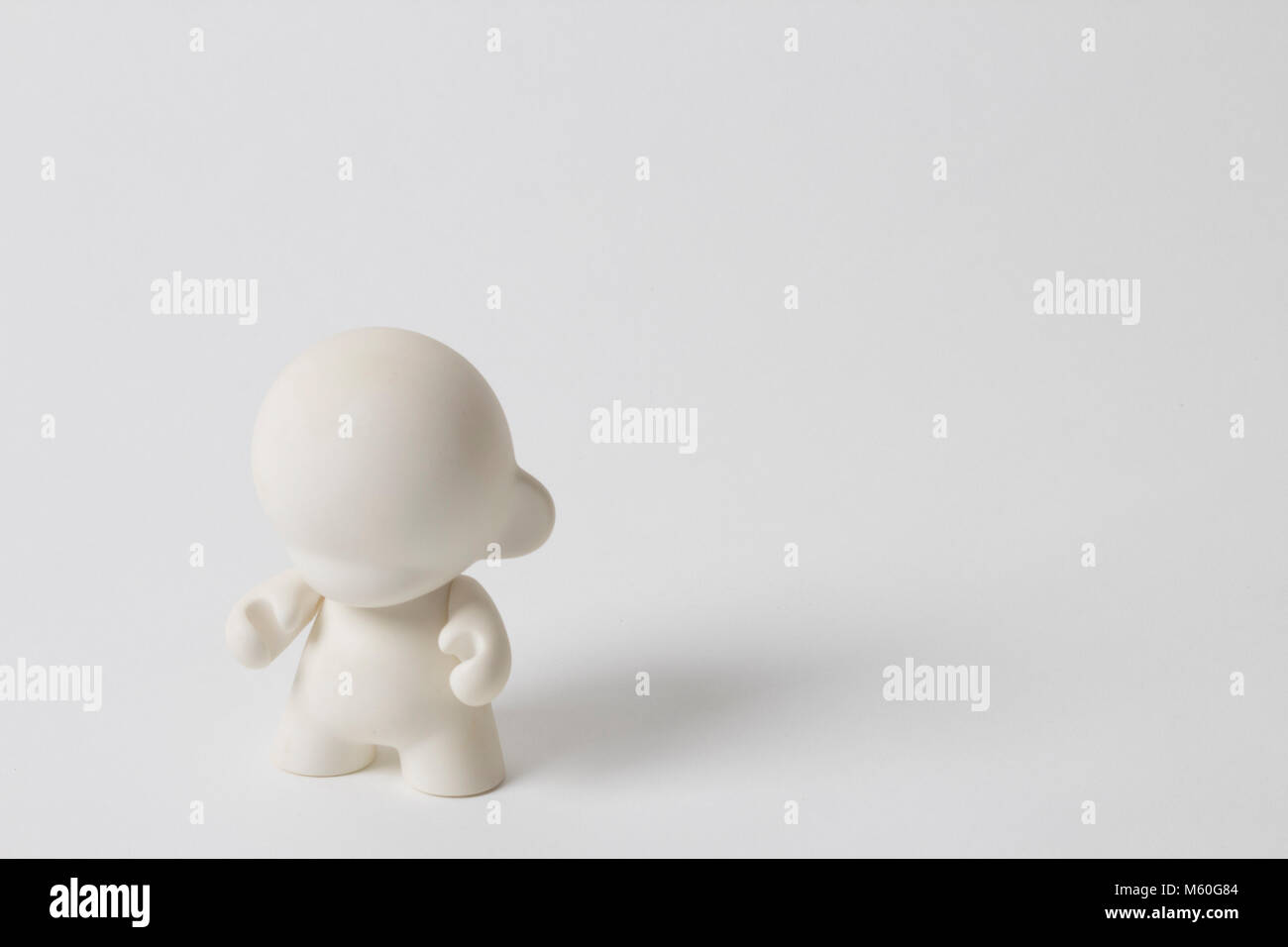 white adult collectable toy on white background Stock Photo