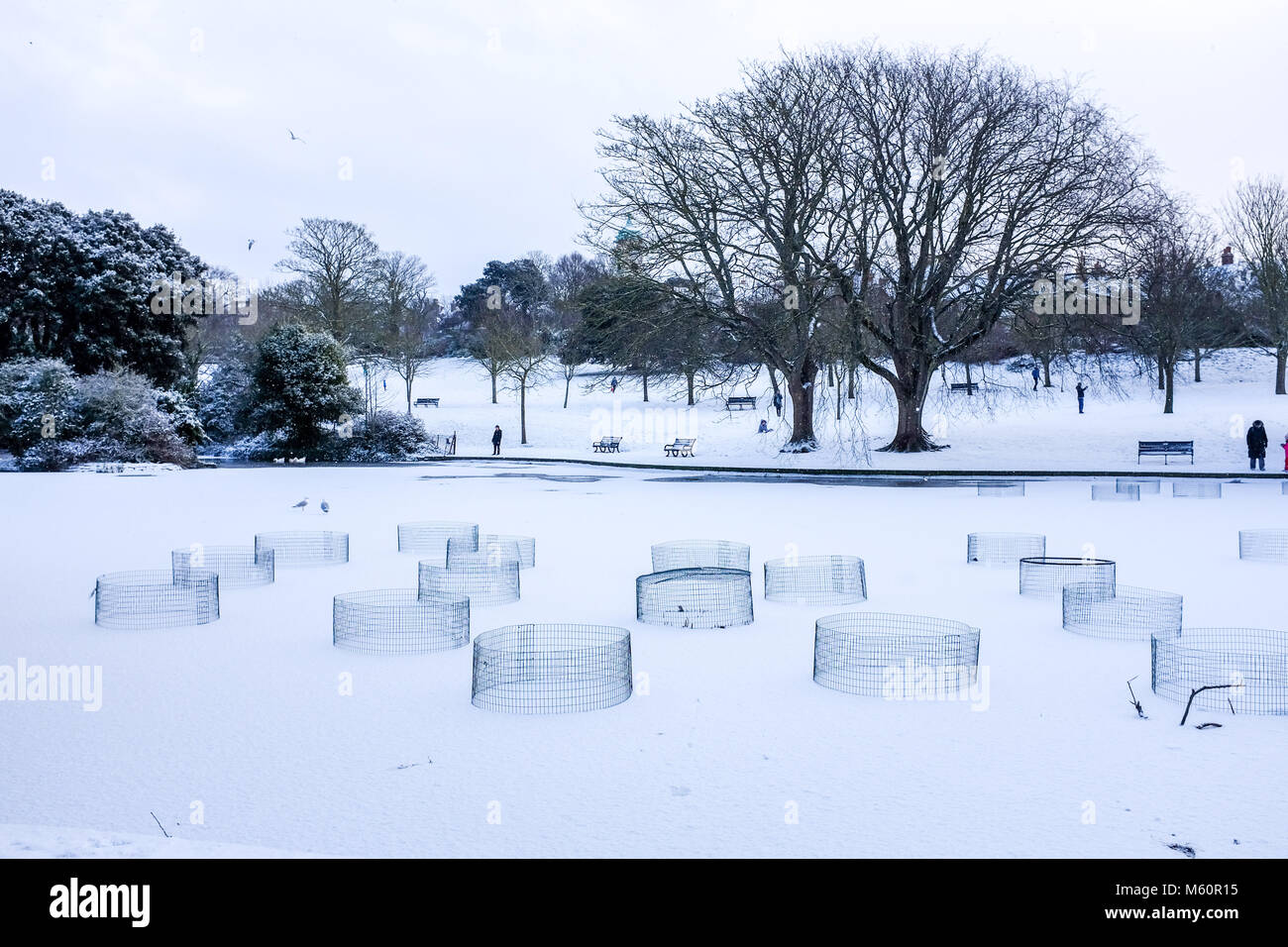 Brighton, UK. 27th Feb, 2018. UK Weather: Snow in Queens Park Brighton today as the 'Beast of the East' snow storms spread across Britain today with more snow and freezing weather forecast for the rest of the week Photograph taken by Simon Dack Credit: Simon Dack/Alamy Live News Stock Photo