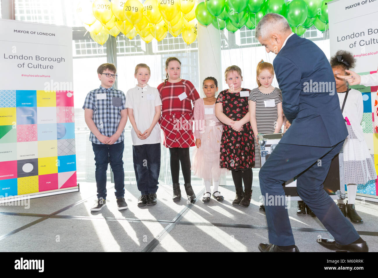City Hall, London, 27th Feb 2018. The Mayor jokes around with children representing one of the Boroughs. The Mayor of London Sadiq Khan announces the winners of the London Borough of Culture competition at a special presentation at City Hall.  The £3.5-million London Borough of Culture award, is a major new initiative. Funding will help the winning boroughs to stage a programme of world-class cultural events and initiatives. Credit: Imageplotter News and Sports/Alamy Live News Stock Photo